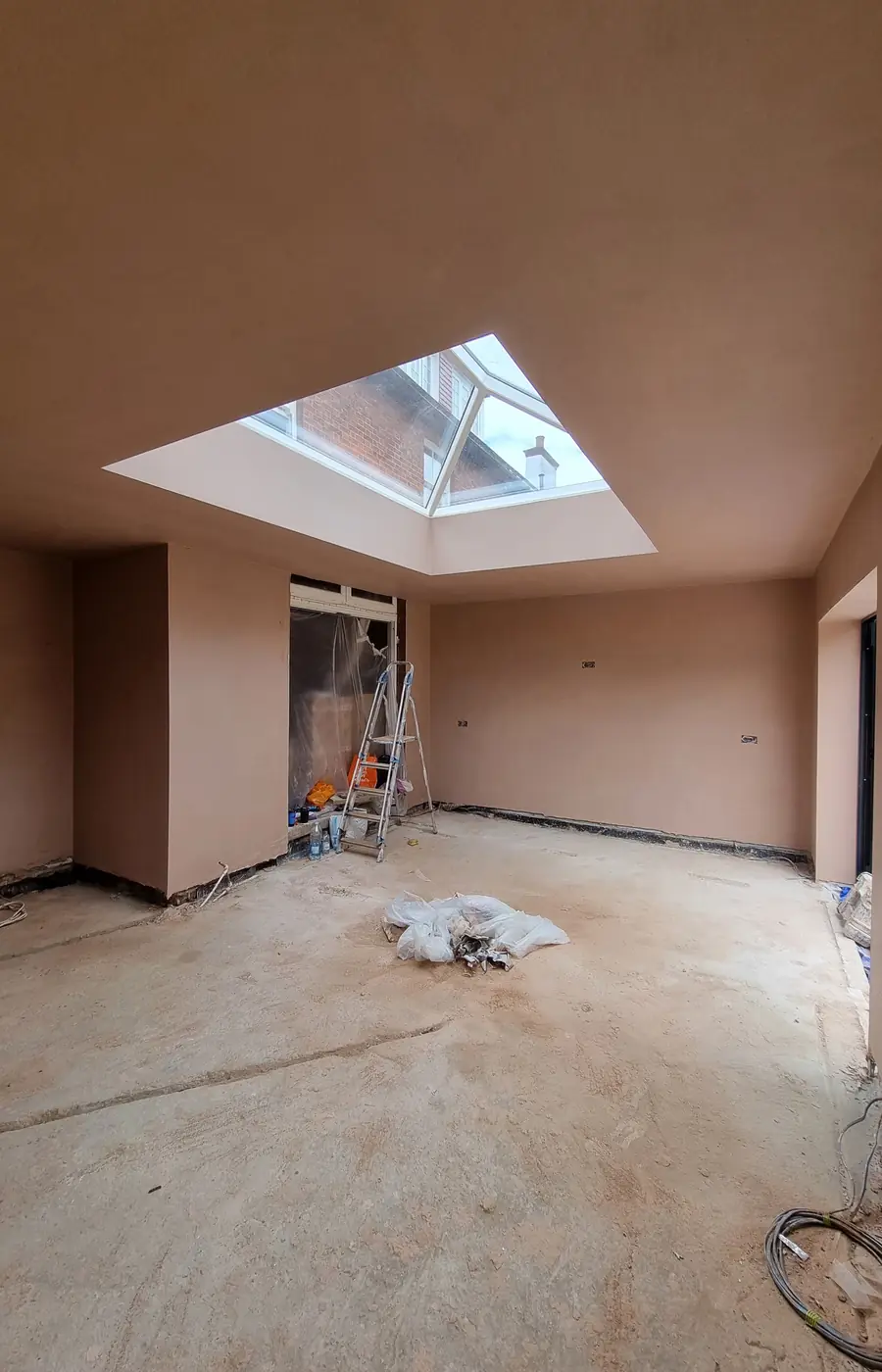 Freshly plastered room beneath a lantern roof light, by ST Plastering & Rendering